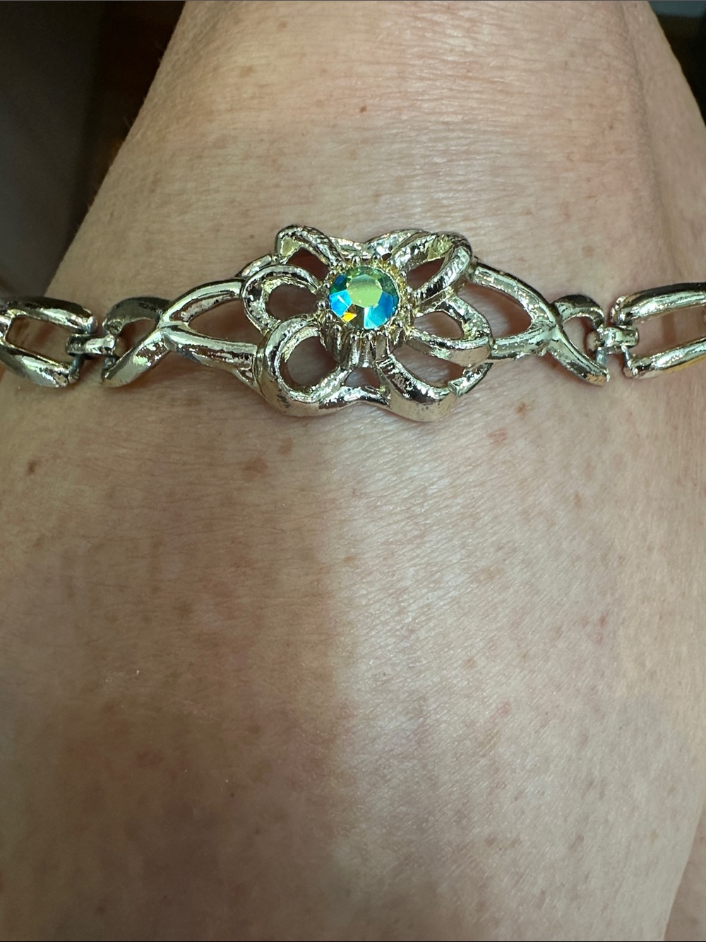 Vintage Delicate light-gold Floral Bracelet with Iridescent Blue Crystal Accent